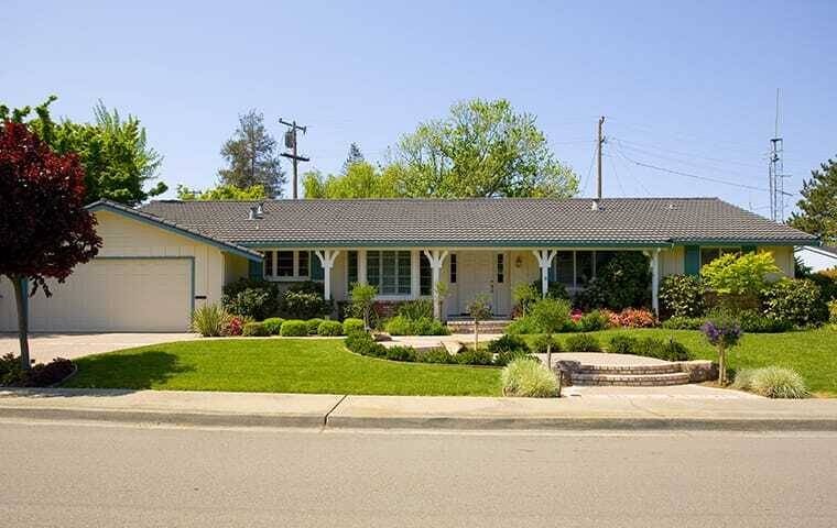 a beige one story house